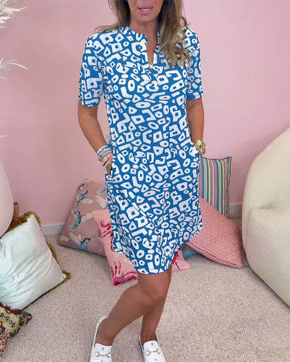 Viaro™ | Printed V-neck dress with pockets