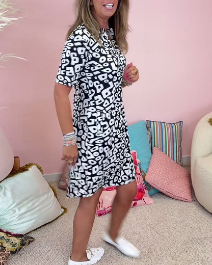 Viaro™ | Printed V-neck dress with pockets